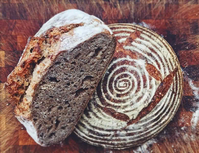 Brown bread with powdered sugar sprinkled on top
